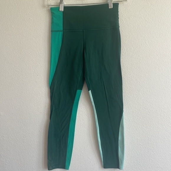 ATHLETA ELATION ASYMMETRICAL 7/8 GREEN COLORBLOCK LEGGINGS - Picture 2 of 6